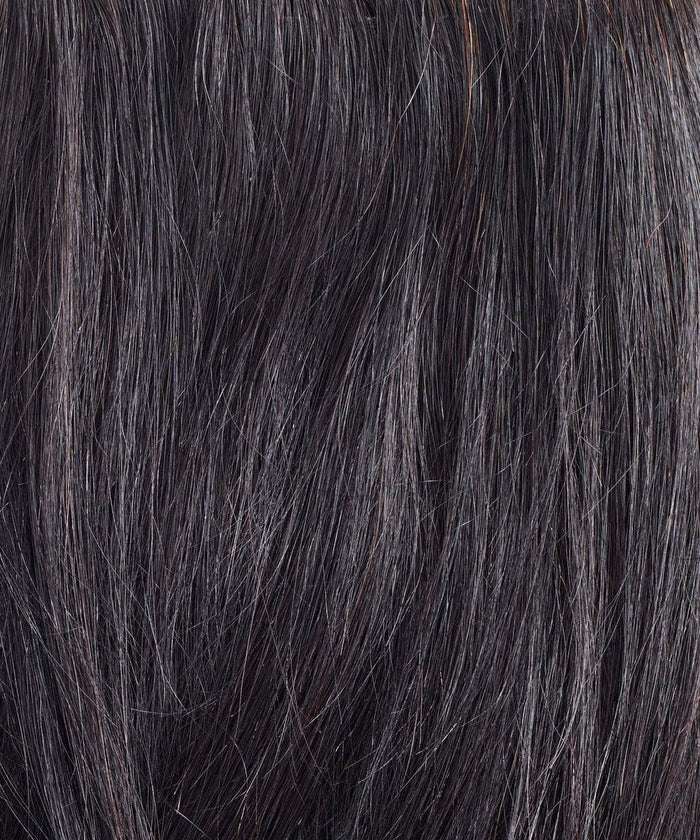 Close-up of Perfect Locks Straight Virgin Machine Weft hair extensions in Natural Black , highlighting straight strands and a subtle natural shine.