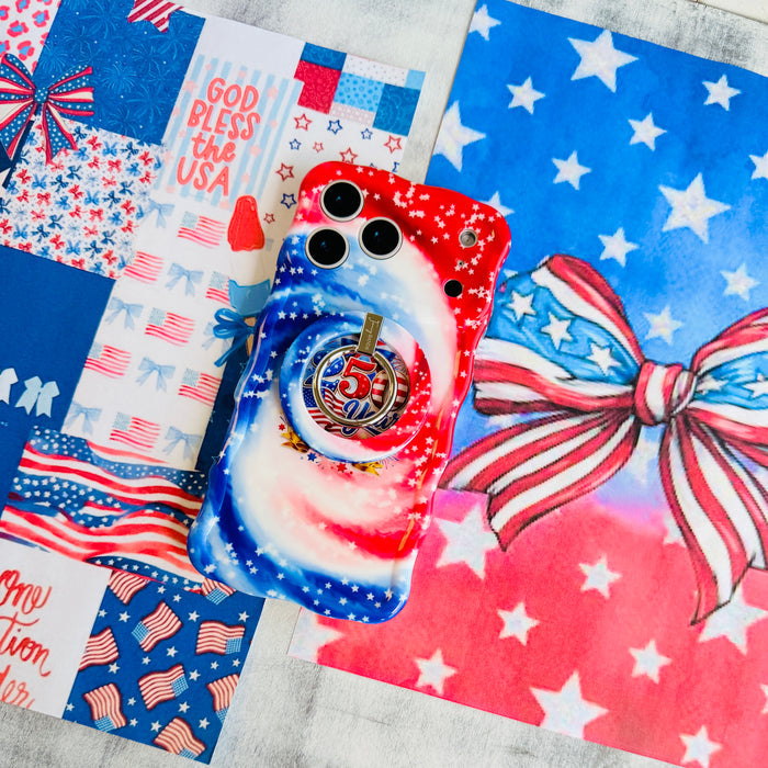 Sweet Freedom 250 patriotic watercolor MagSafe phone grip ring with swirling red white and blue pattern and white stars compatible with iPhone and Samsung