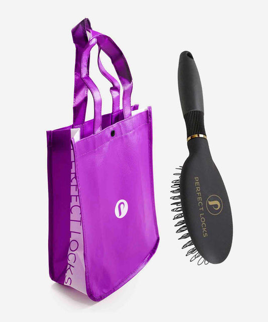 A purple tote bag with two handles and a white logo sits beside a black hairbrush labeled Perfect Locks with a gold logo on its handle.