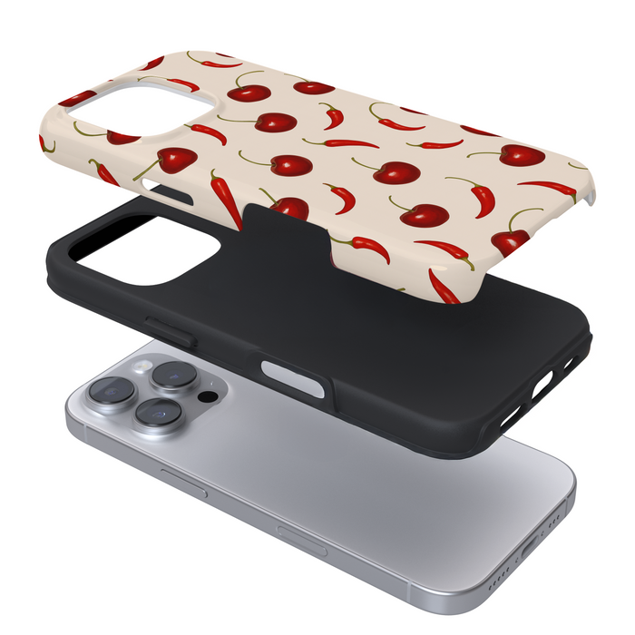 Expanded view of a phone case with a cherry and chillis pattern on a white background