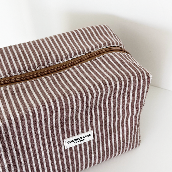 Coconut Lane towel makeup bag with chestnut brown and white stripes, soft textured fabric, zip closure.