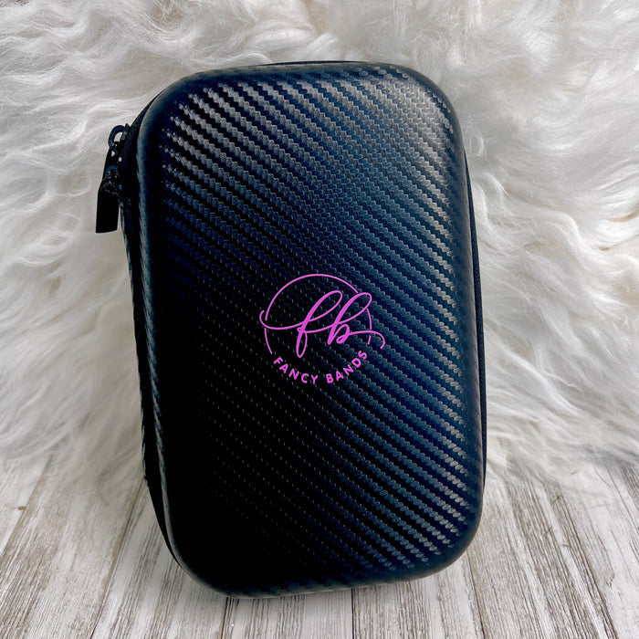 Travel Size Fancy Band Storage Case Two Colors Available — Case made of PU leather, Nylon, Multi spandex, Lycra Dimensions are W 8 1/2" x L 8 1/2" x H 2 1/4" This item is storage case only bands no...
