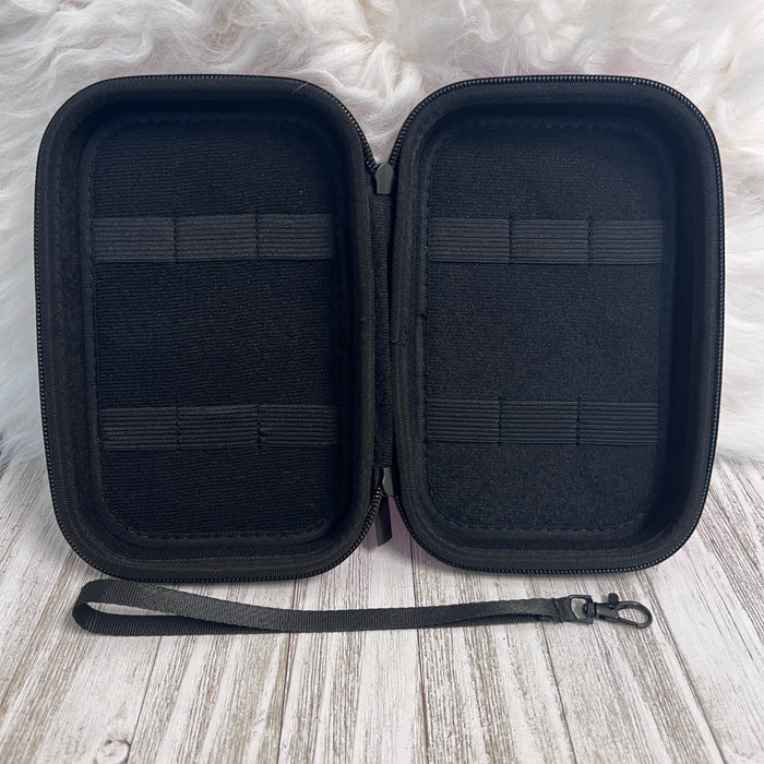 Travel Size Leopard Print Fancy Band Storage Case — Case made of PU leather, Nylon, Multi spandex, Lycra Dimensions are W 8 1/2" x L 5 1/2" x H 2 1/4" This item is storage case only bands not inclu...