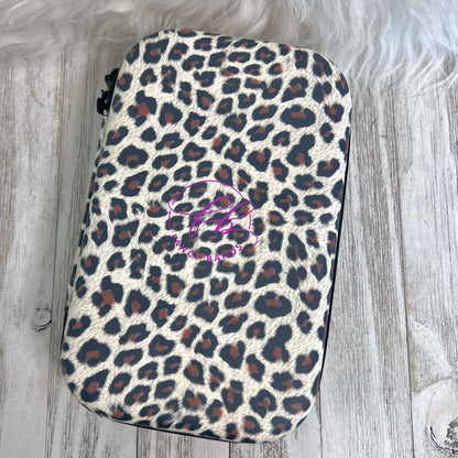 Travel Size Leopard Print Fancy Band Storage Case — Case made of PU leather, Nylon, Multi spandex, Lycra Dimensions are W 8 1/2" x L 5 1/2" x H 2 1/4" This item is storage case only bands not inclu...