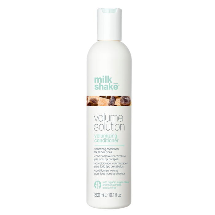 milk_shake  Volume Solution volumizing conditioner bottle on a white background