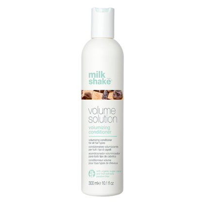 milk_shake  Volume Solution volumizing conditioner bottle on a white background