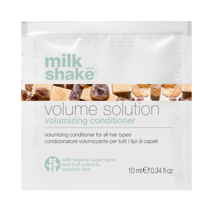 milk_shake  Volume Solution volumizing conditioner packet on a white background