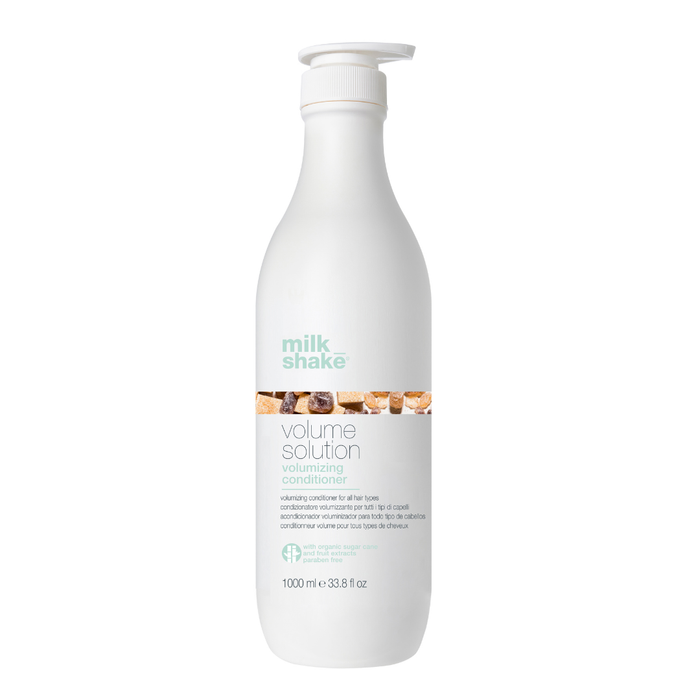 White bottle of milk_shake Volume Solution conditioner on a white background