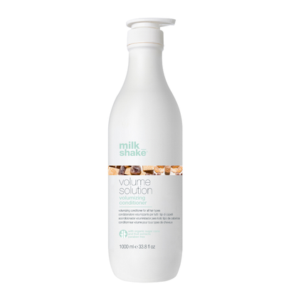 White bottle of milk_shake Volume Solution conditioner on a white background