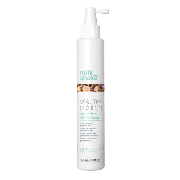 milk_shake  Volume Solution volumizing styling spray bottle on a white background