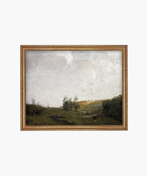 A serene landscape painting with a cloudy sky over green rolling hills. Sparse trees dot the scene, evoking a tranquil, pastoral atmosphere. | Wildwood Home Co.
