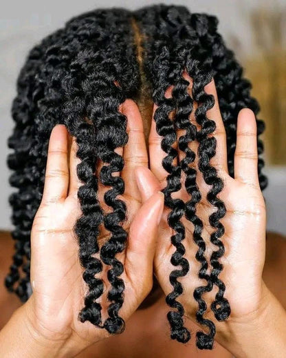 Shea butter, rice water, African black soap shampoo, growth oil, and scalp stimulator in butterbloom hair growth bundle for natural hair care.