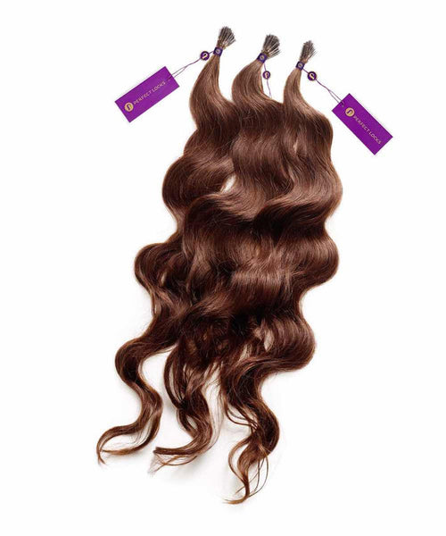 Three bundles of wavy, brown human hair extensions with purple tags, displayed on a white background.