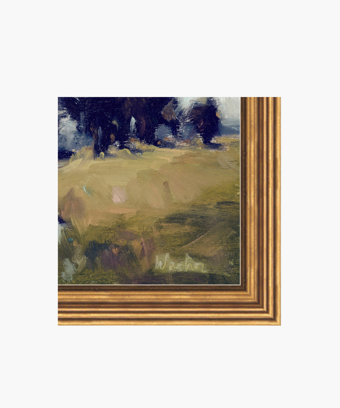 A detailed picture of an impressionist landscape painting highlighting its neutral color palette and gold frame.  | Wildwood Home Co.