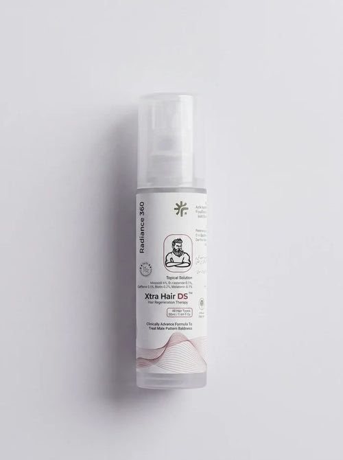 Skincare bottle labeled 'Xtra Hair DS' on a light gray background